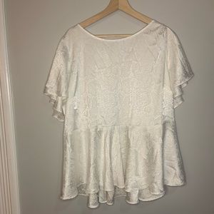 3/20$ Torrid size 3 white “snake skin” embossed blouse.